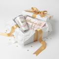 Luxury bridal gift set with tumbler, earrings, and sash in a keepsake gift box with white tissue and satin ribbon